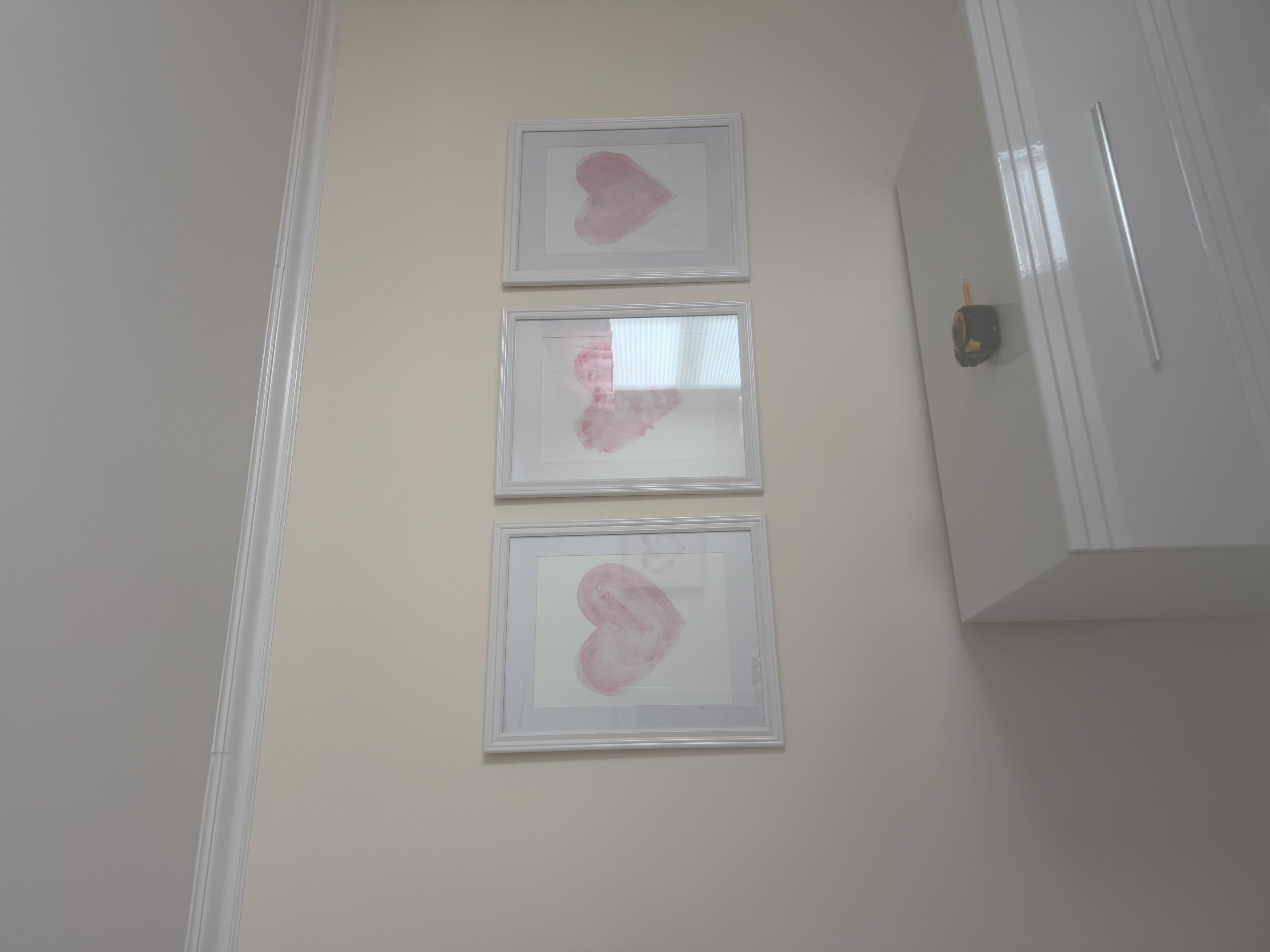 Pictures hung on wall in Monmouth County NJ